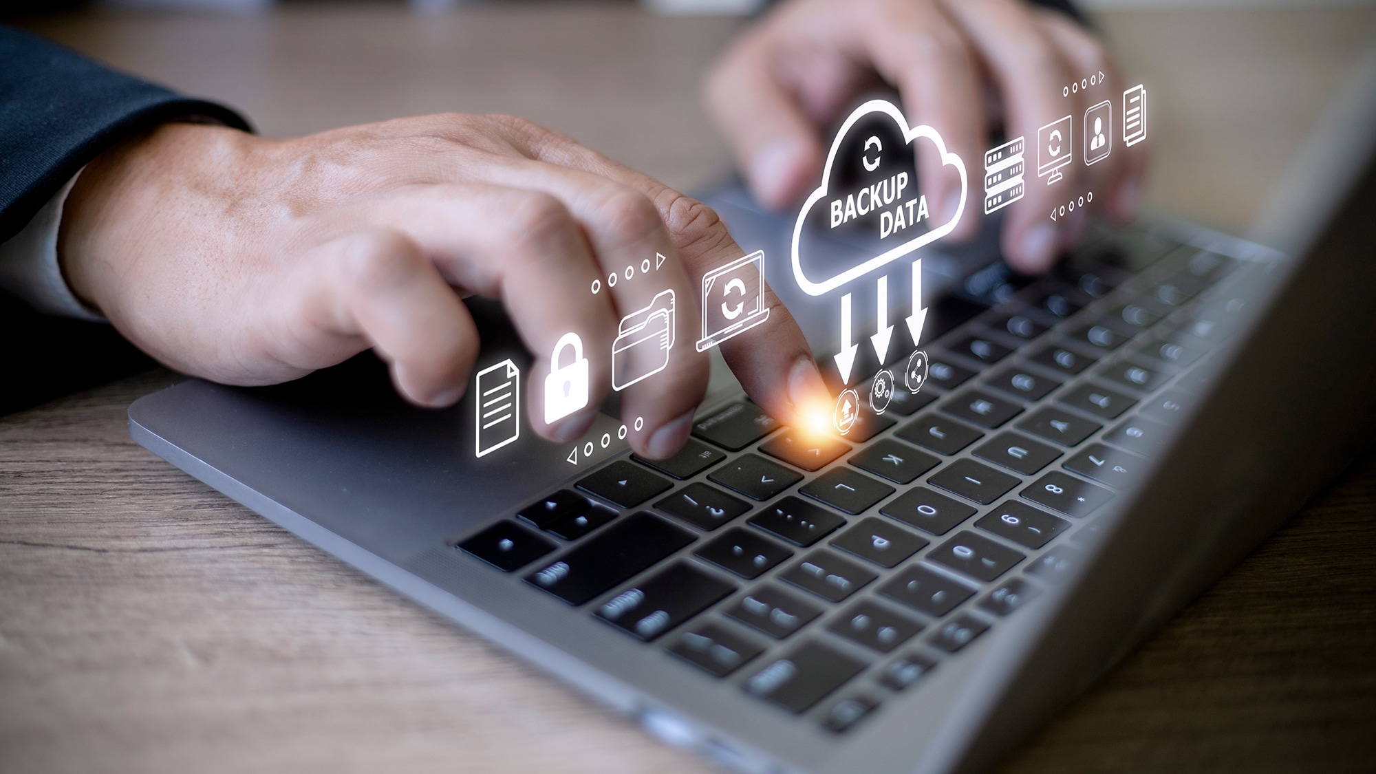 Businessman using a computer to backup storage data