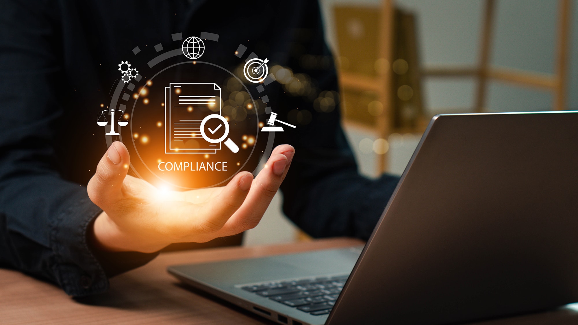 Businessman use laptop with compliance icon on virtual screen.