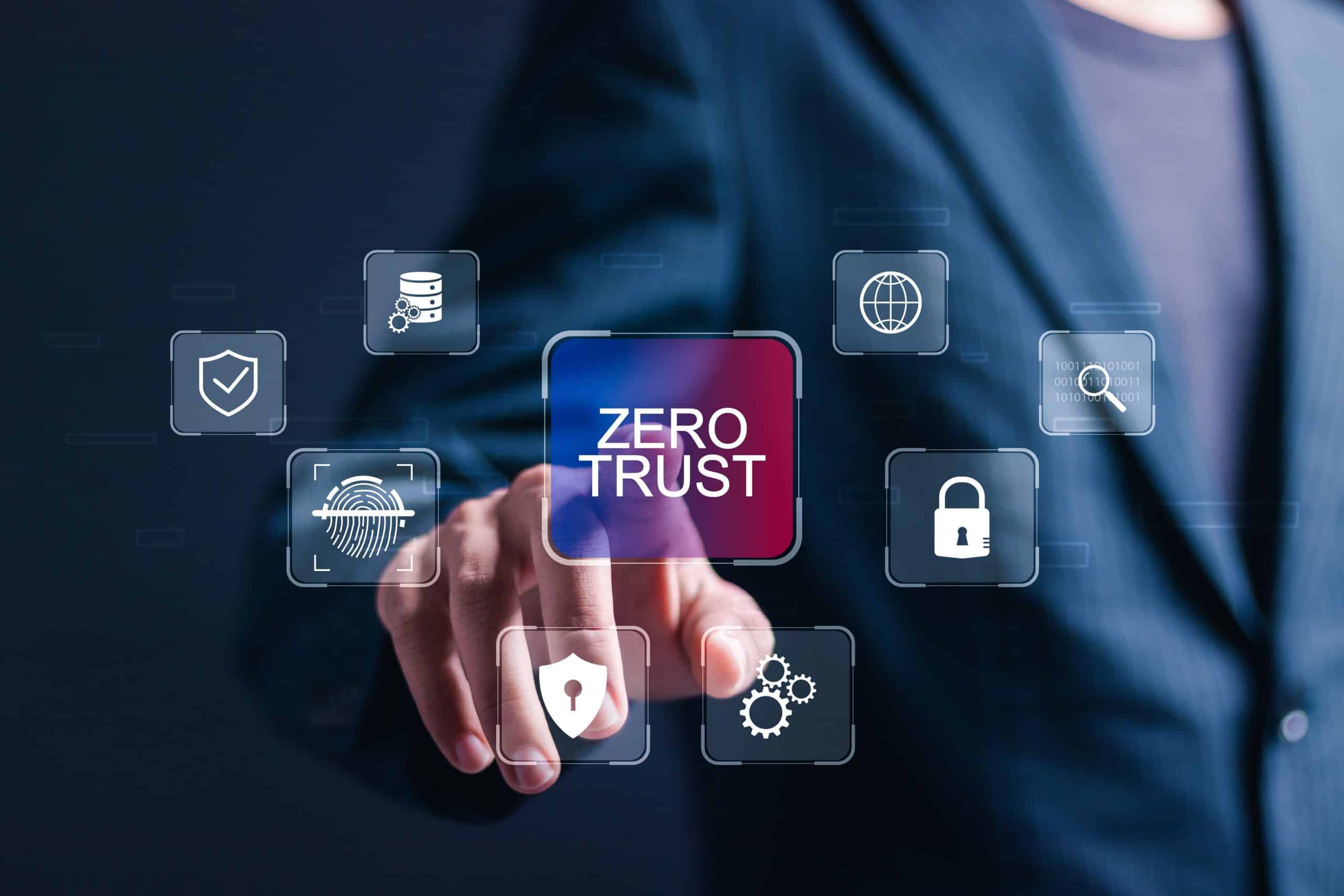 Businessman touching virtual zero trust icon for business information security network.