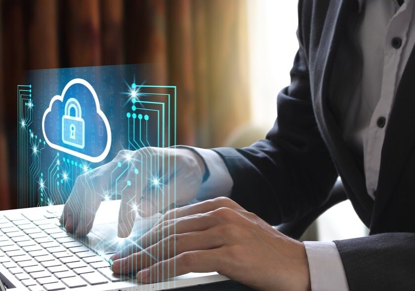 Businessman use Laptop with padlock and cloud technology