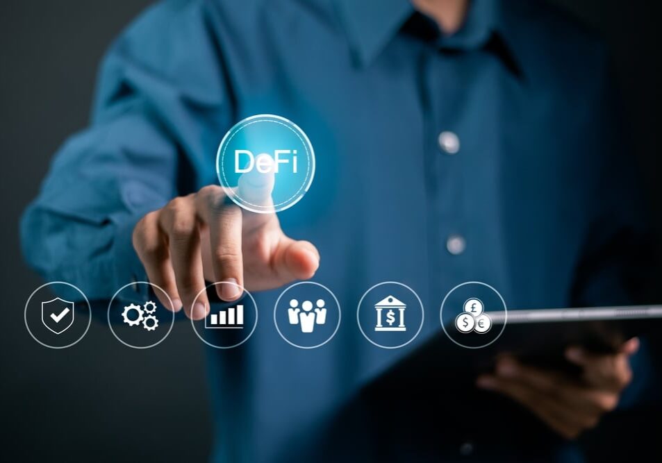 Person touching DeFi icon on virtual screen.