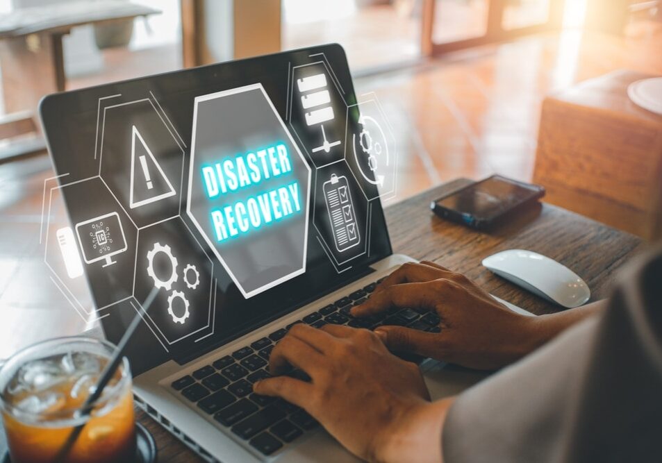 Disaster,Recovery,Concept,,Person,Hand,Using,Laptop,Computer,With,Disaster Disaster Recovery concept