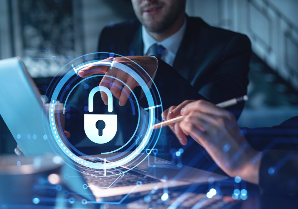 Two colleagues working together to protect clients confidential information and cyber security Two colleagues working together to protect clients confidential information and cyber security