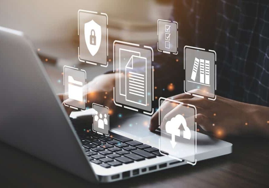 Businessman,Using,A,Computer,To,Document,Management,Concept,,Online,Documentation Businessman using a computer to database and digital file storage