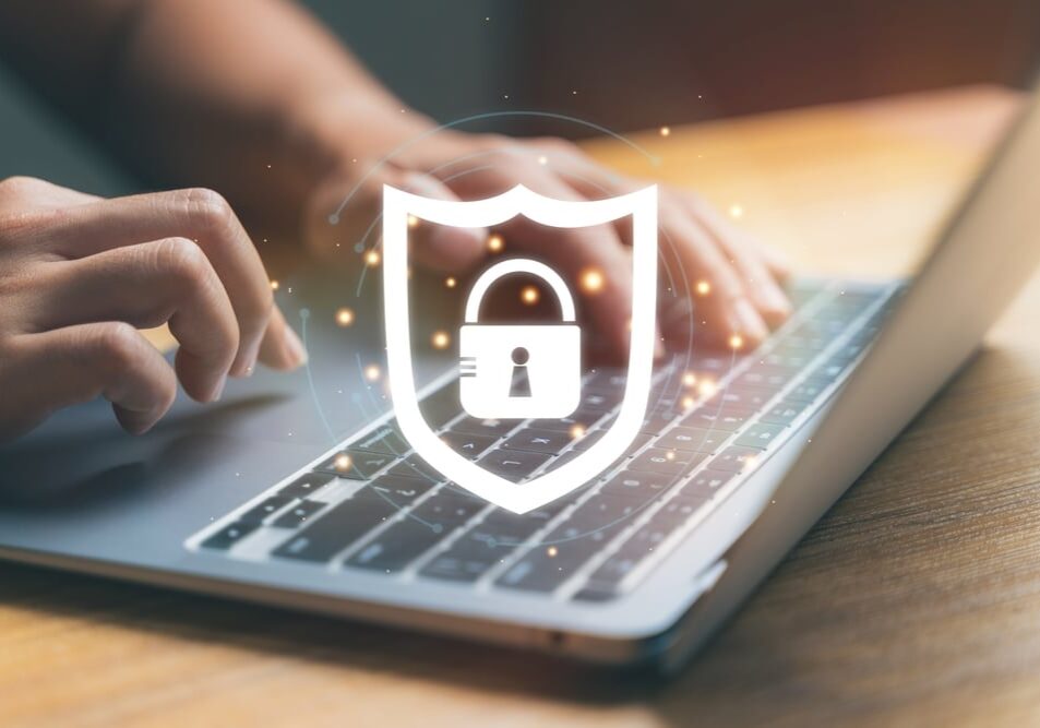 Close,Up,Hand,Using,Laptop,With,Security,Lock,Icon.,Social Close up hand using laptop with security lock