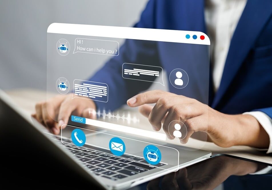 Businessman using AI chatbot conversation assistant in app on device