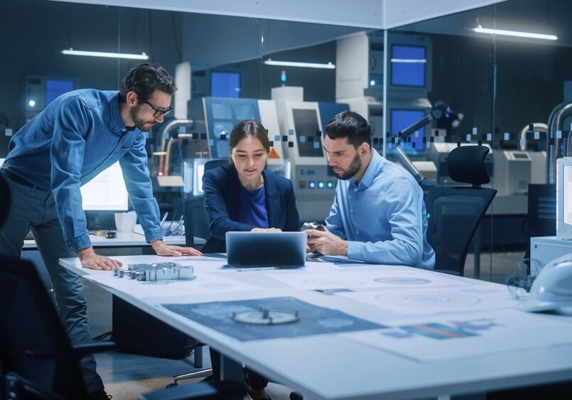 Factory,Office,Meeting,Room:,Team,Of,Engineers,Gather,Around,Conference IT Engineers Gather Around Conference Table