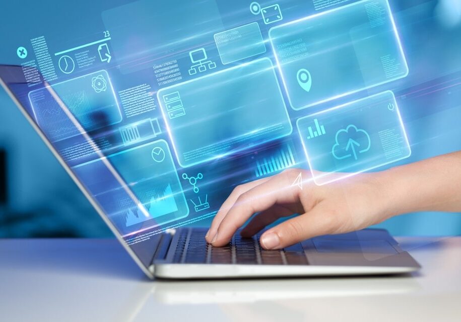 Hand using laptop with database reports and online work concept Hand using laptop with database reports and online work concept