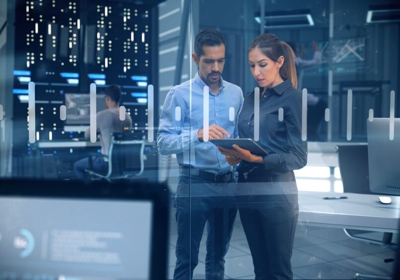 Professional,Male,And,Female,Engineers,Working,In,High,Tech,Research IT managers Working in Data Servers