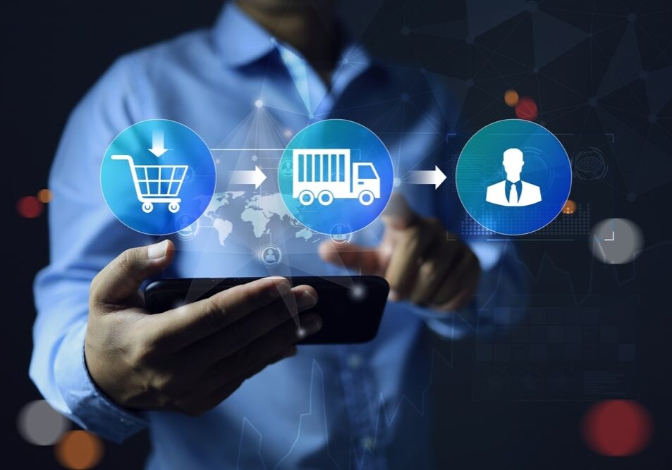 Businessman hand holding smartphone and tracking parcel package shipment